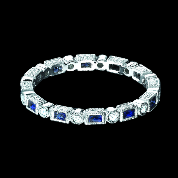 18K GOLD WEDDING RING HAS SAPPHIRE BAGUETTES AND ROUND DIAMONDS