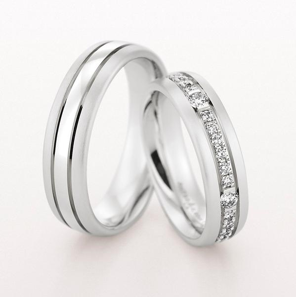WEDDING RING SATIN FINISH WITH DIAMONDS IN CENTER 55MM - RING ON RIGHT