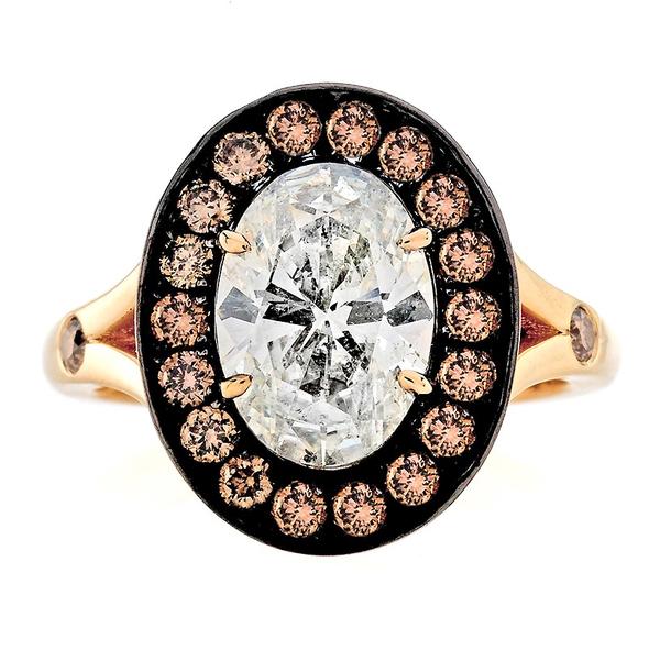 OVAL DIAMOND SURROUNDED BY BLACK HALO SET WITH CHAMPAGNE DIAMONDS