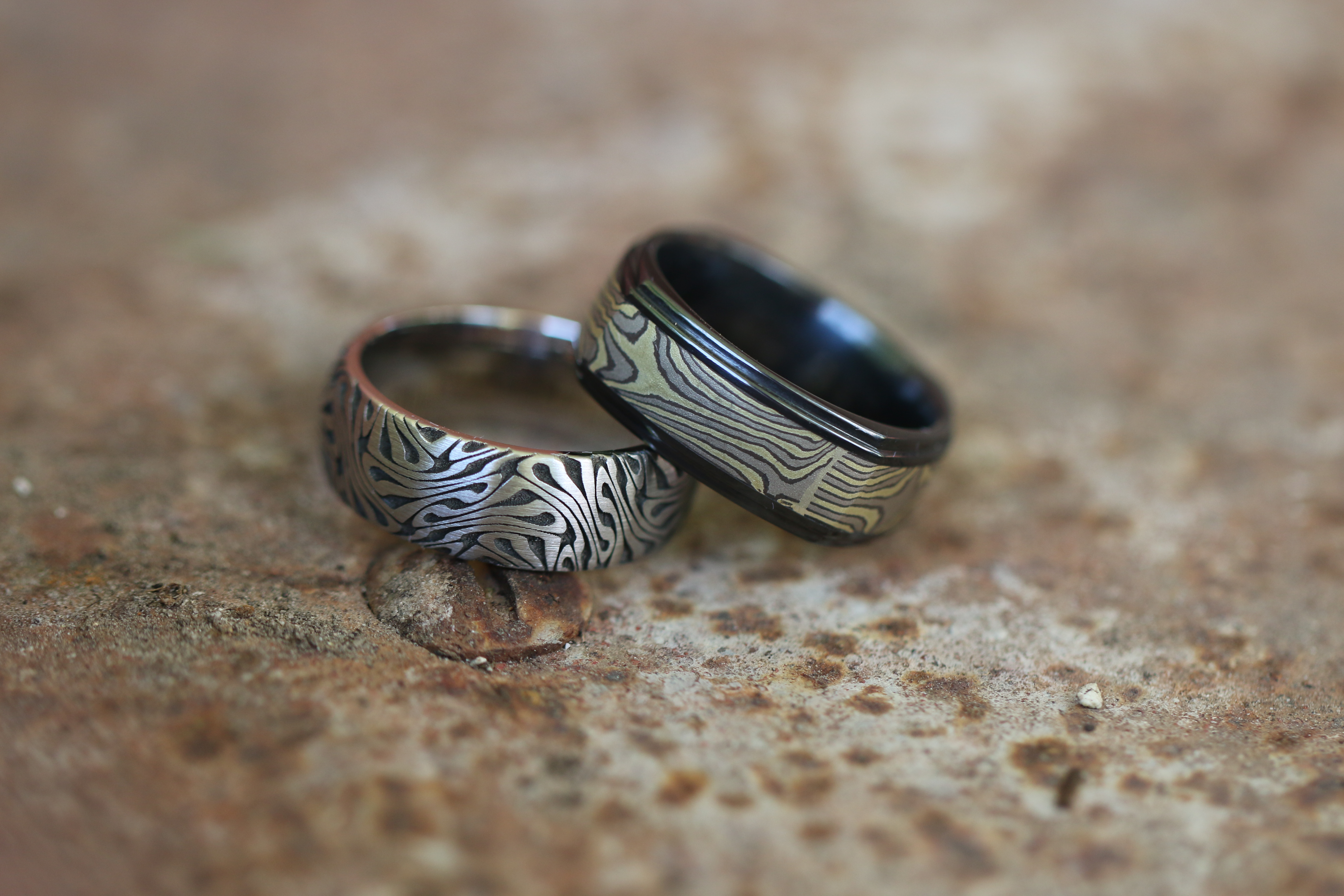 DAMASCUS STEEL,BLACK ZIRCONIUM,BOLD DESIGNS