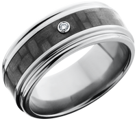 Titanium 9mm flat band with rounded edges and a 4mm inlay of black Carbon Fiber with a bezel-set white diamond accent