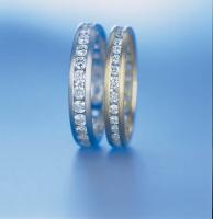 PLATINUM AND DIAMOND WEDDING RING 38MM - RING ON LEFT