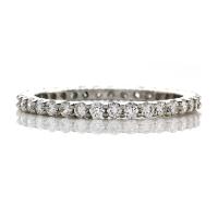 SHARED PRONG HAND MADE ETERNITY BAND GOLD OR PLATINUM 75 CARATS