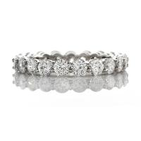 SHARED PRONG HAND MADE ETERNITY BAND GOLD OR PLATINUM 25 CARATS